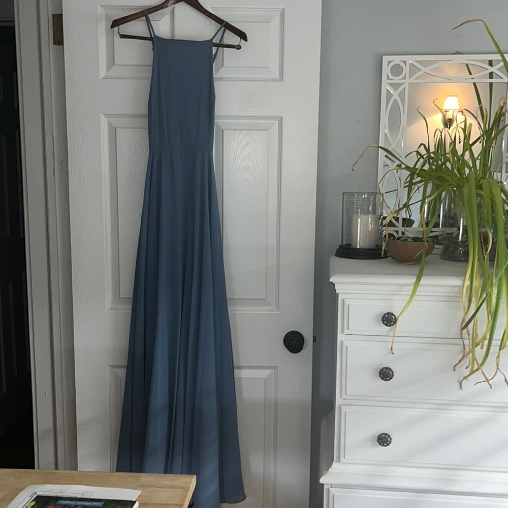 Light blue floor length dress with criss cross adjustable open back